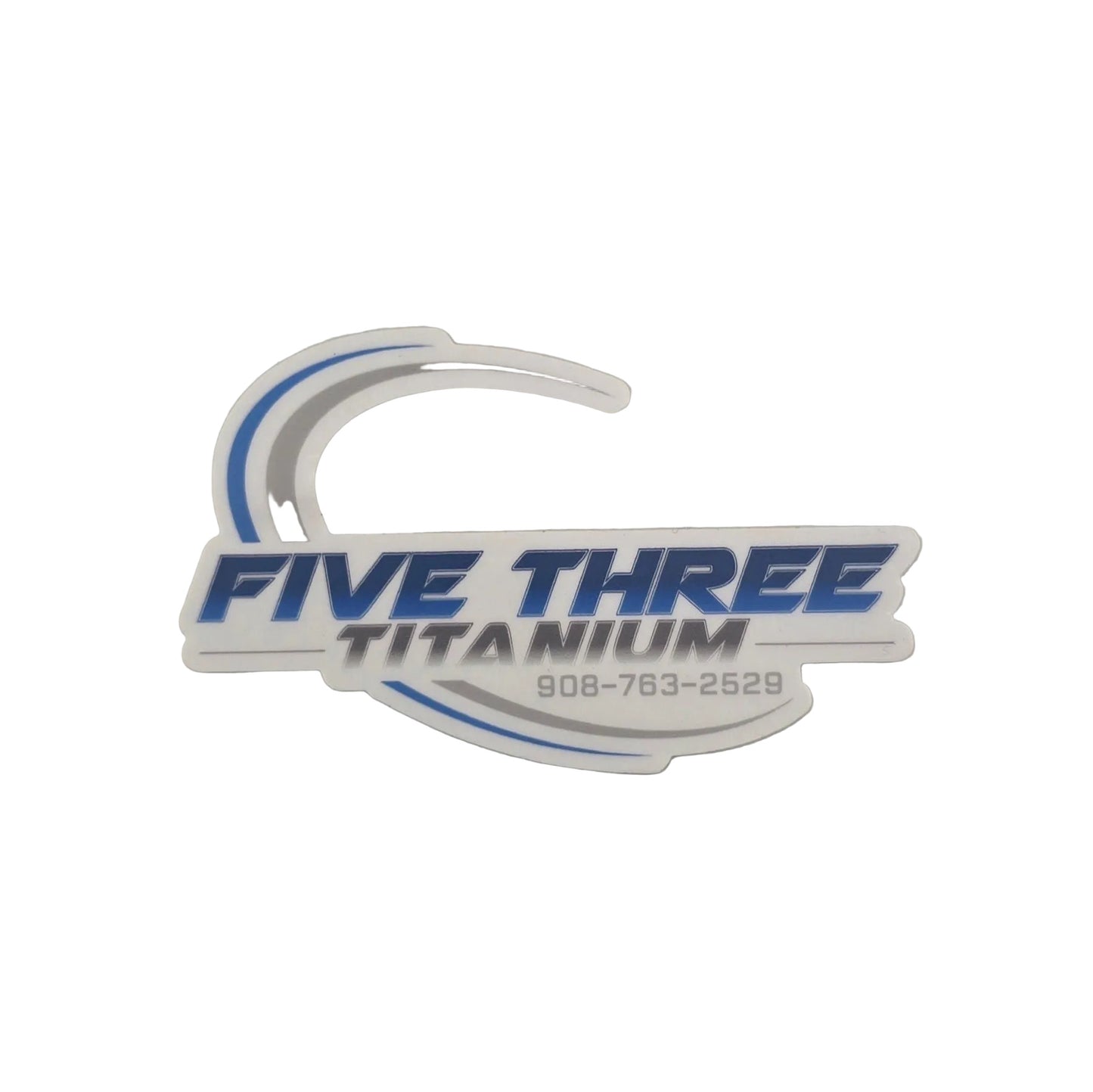A die-cut vinyl sticker featuring the text 'FIVE THREE TITANIUM' in blue and gray lettering with a phone number underneath, set against a light gray textured background.