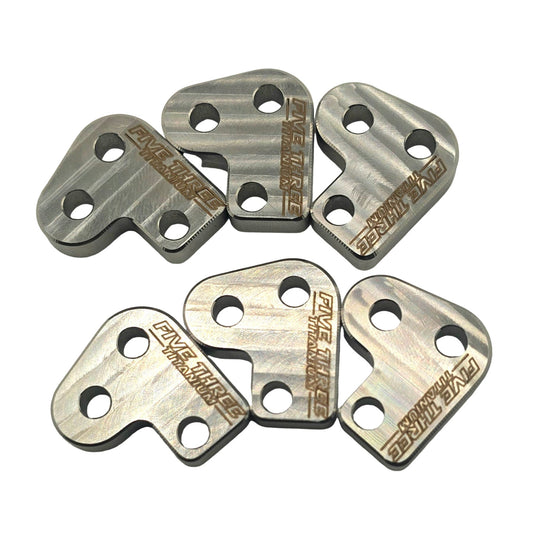 A set of six stainless steel clutch levers with engraved text on them, displayed against a white background.